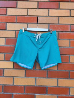 Loco Boutique Teal Board Shorts | Best fit 10-12